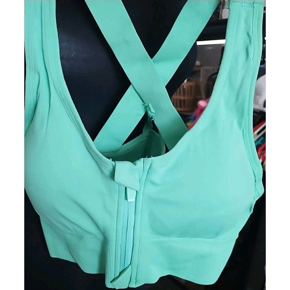 sports bra features a high-impact design with a strappy back.3 Pack